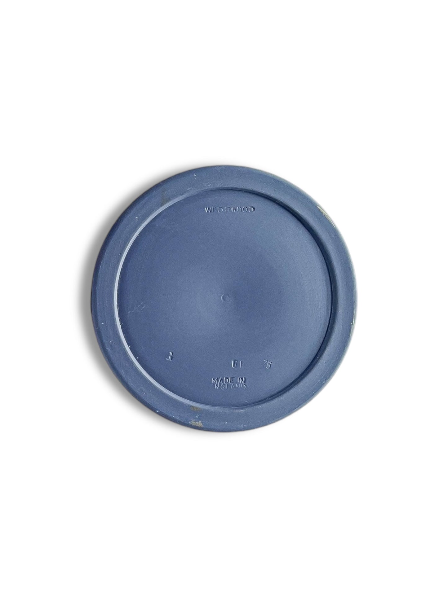Wedgewood blue porcelain plate base with embossed markings and slight wear