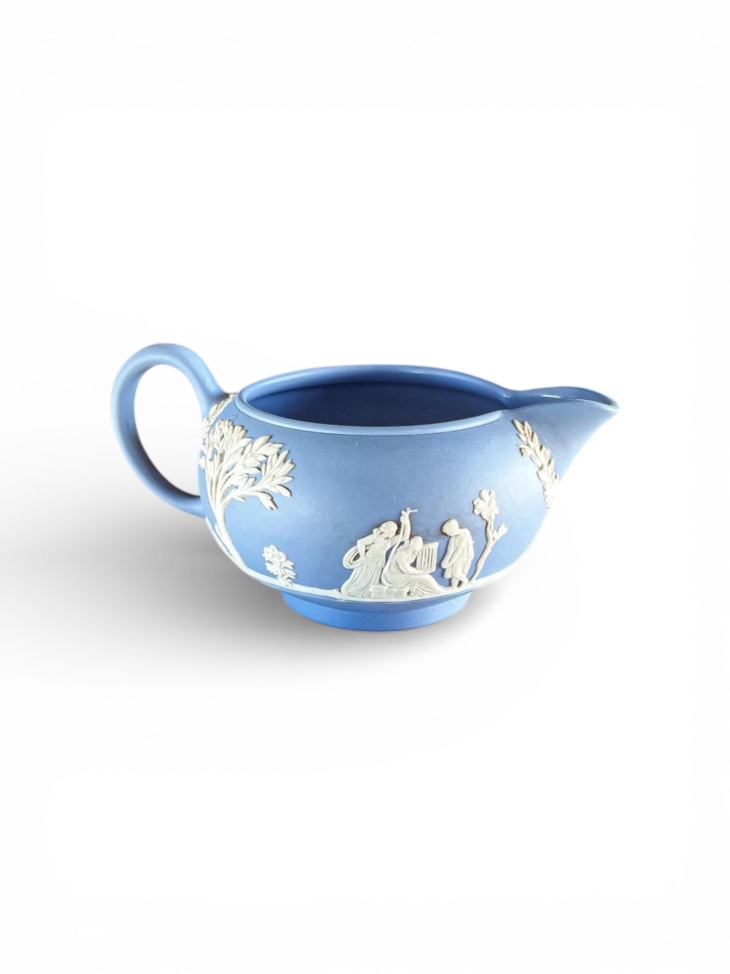 Blue Jasperware porcelain pitcher with white classical relief figures and floral details