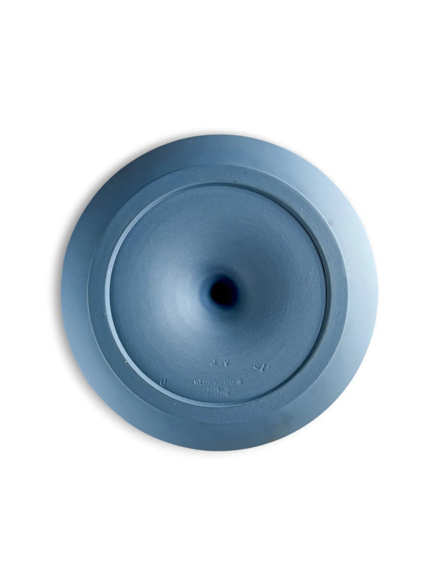 A top-down view of the underside of the Wedgwood footed compote. This shot reveals the tapered shape of the pedestal and the circular base, with the authentic maker's markings clearly impressed in the center.