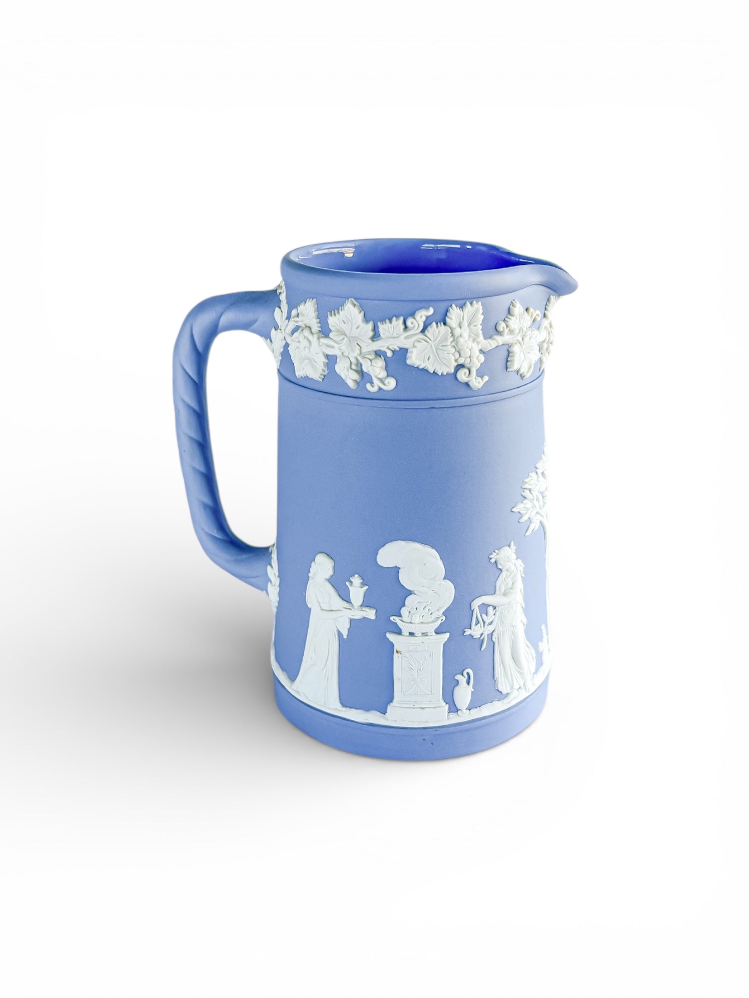 Blue Jasperware pitcher with white classical relief depicting figures and grapevine motif