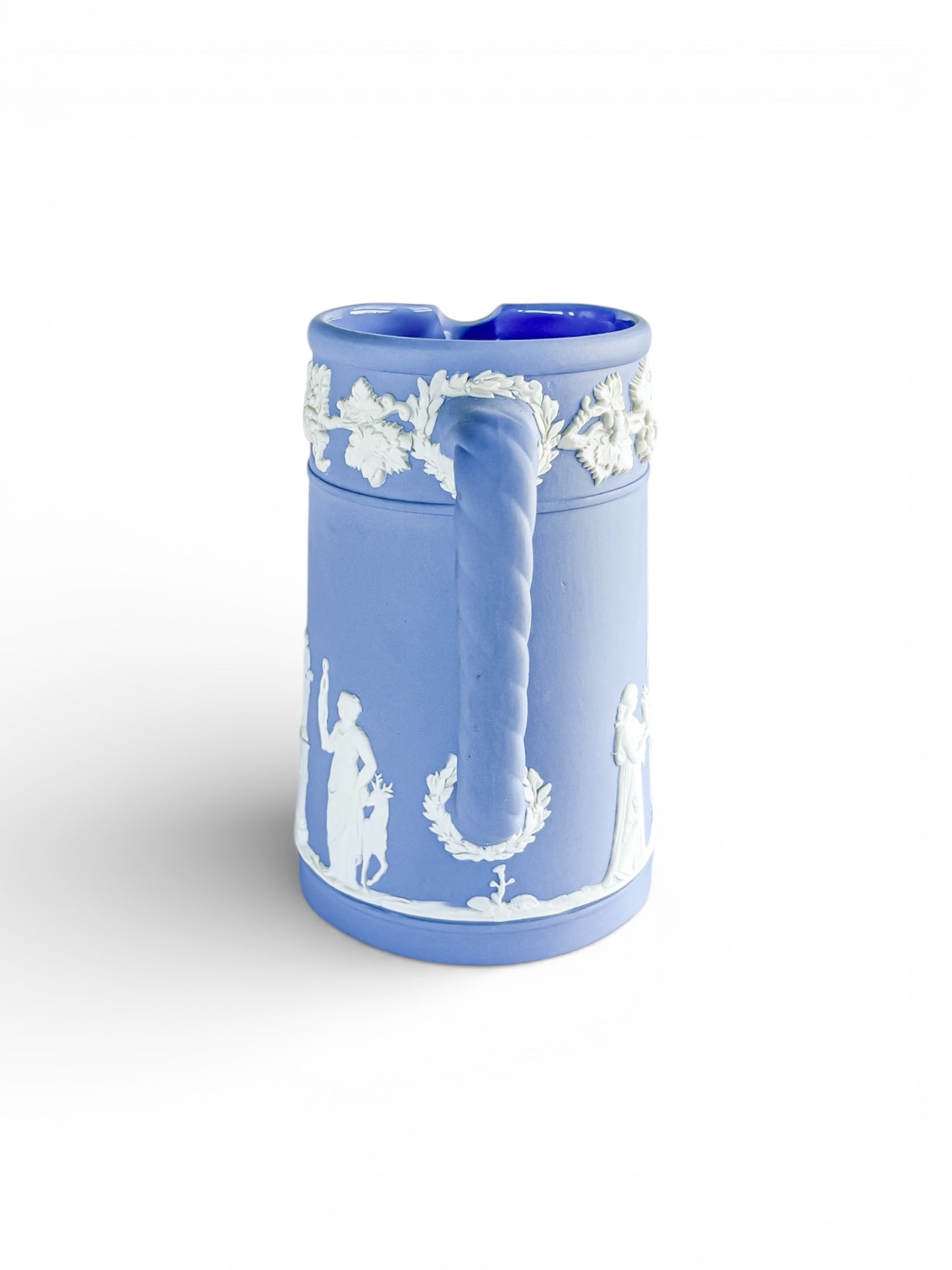 Blue Jasperware porcelain mug with twisted handle and white classical relief decorations