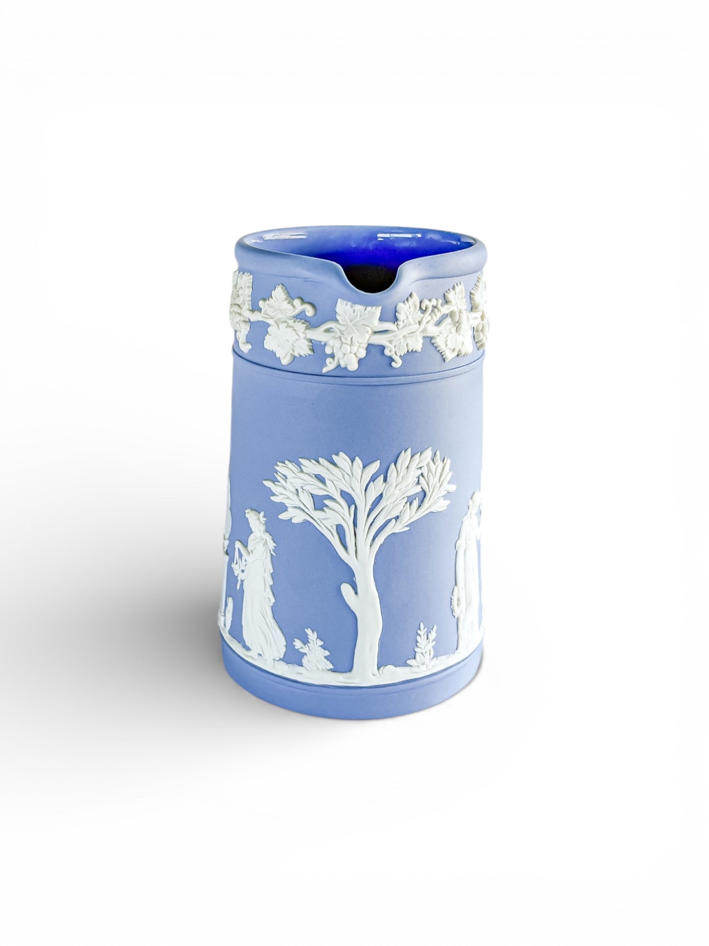 Blue Jasperware jug with white classical reliefs of figures and tree, decorative grapevine border