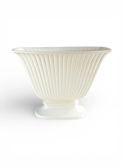 White porcelain fluted bowl with pedestal base, vintage ceramic tableware on white background