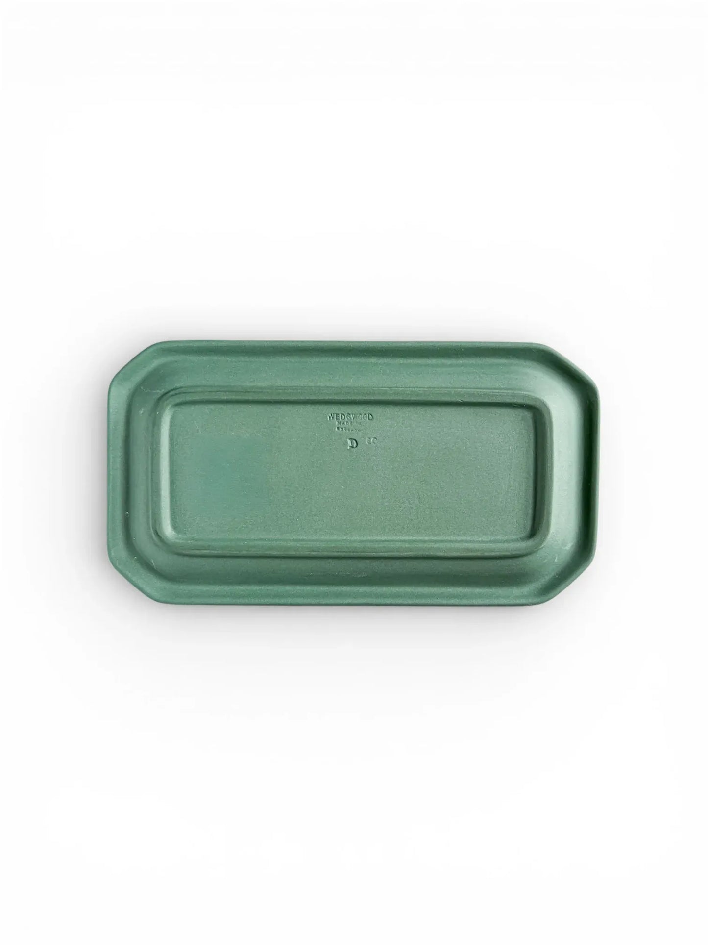 The underside of the octagonal Spruce Green tray, showing the recessed base and the authentic impressed maker's marks.