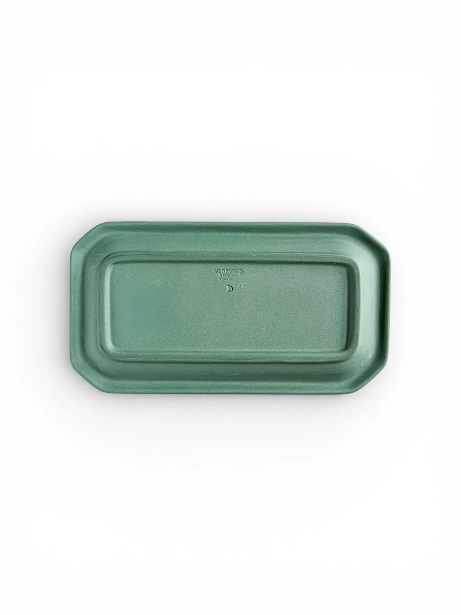 The underside of the octagonal Spruce Green tray, showing the recessed base and the authentic impressed maker's marks.