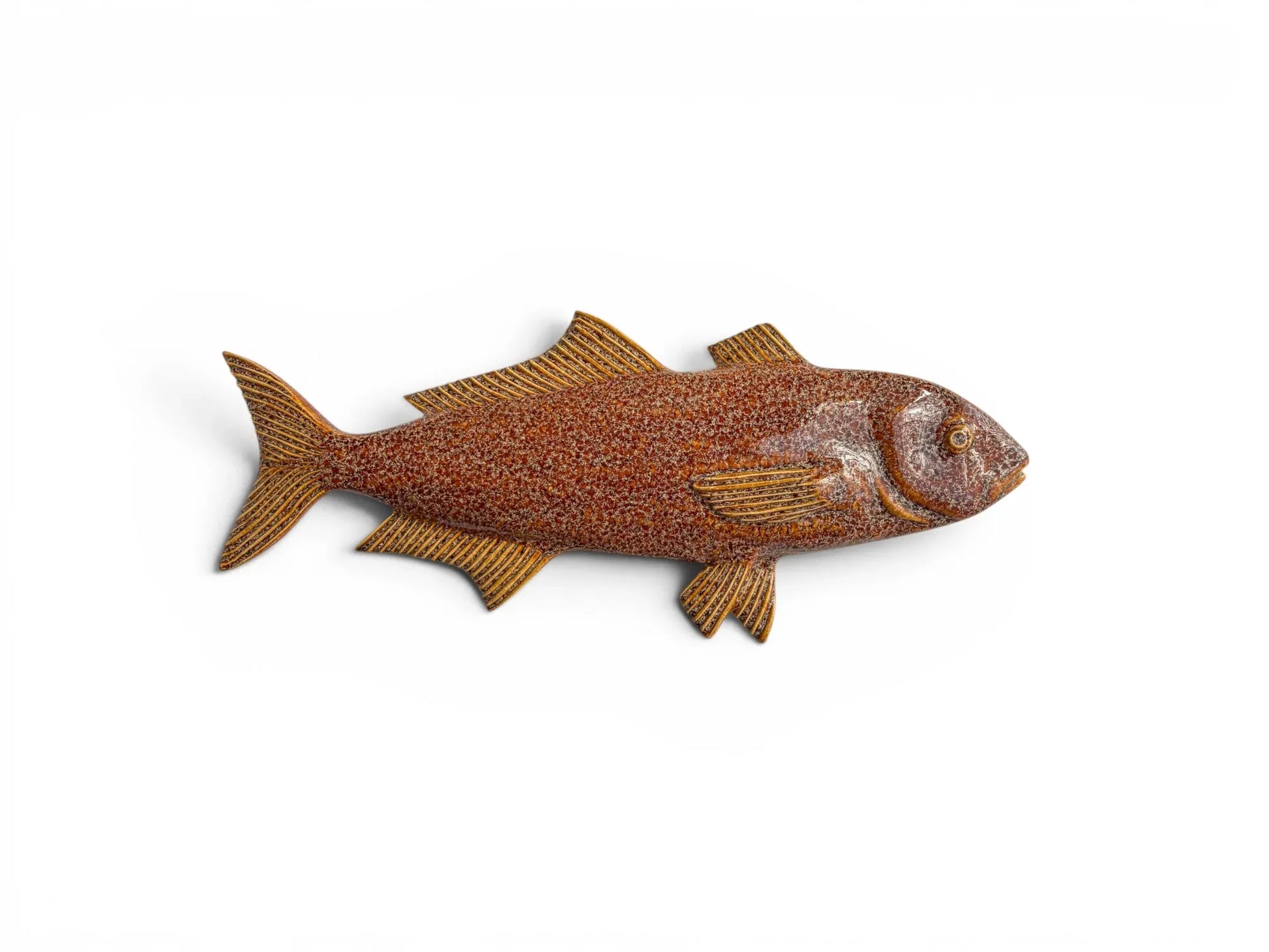 A side-profile view of the sculptural Ice Fish in brown reactive glaze. The finish is a rich, warm chocolate-brown with a dense, shimmering reactive texture that highlights the sculptural ridges of the fins and gills.