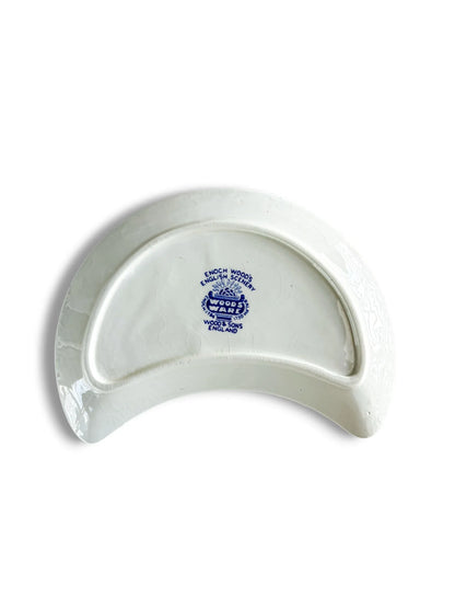 Bottom view of a Wood & Sons 'English Scenery' crescent plate showing the 'Enoch Wood's English Scenery' maker's mark and backstamp.